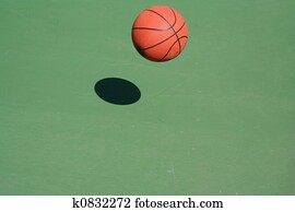 can you touch a ball bouncing on the basket