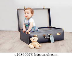 baby with suitcase