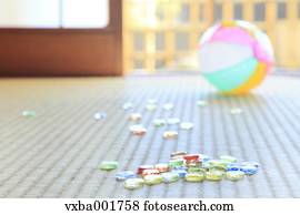 Paper balloon and marbles on tatami mat