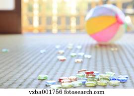 Paper balloon and marbles on tatami mat
