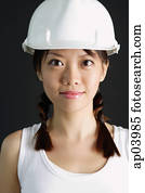Young woman wearing hard hat Young woman wearing hard hat