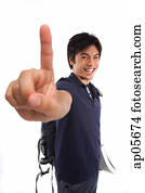 Young man making hand sign Young man making hand sign