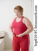 overgewicht vrouw, het meten van taille