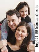 Portrait of parents and young daughter