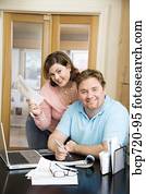 Couple paying bills