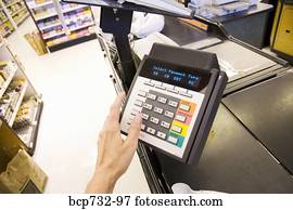Person using debit card transaction machine