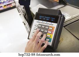 Person using debit card transaction machine