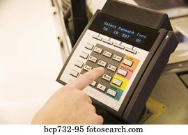 Person using debit card transaction machine