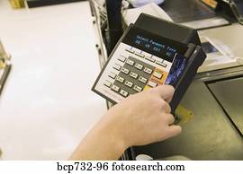 Person using debit card transaction machine