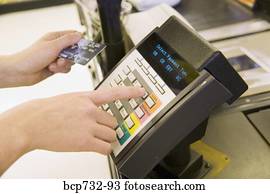 Person using debit card transaction machine