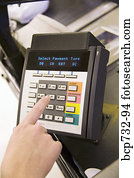 Person using debit card transaction machine