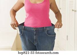 mujer, en, pantalones grandes, presumiendo, pérdida de peso