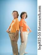 man, en, een, vrouw, vervelend, los, broek, om te tonen, hun, gewicht aderlating