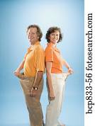 man, en, een, vrouw, vervelend, los, broek, om te tonen, hun, gewicht aderlating