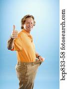 man, vervelend, los, broek, en, gesturing, beduimelt omhoog, meldingsbord