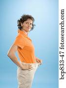 vrouw, vervelend, los, broek, om te tonen, gewicht aderlating