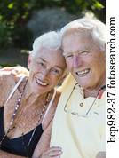 Portrait of a senior couple sitting outdoors