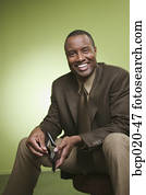 Man holding his wallet open.