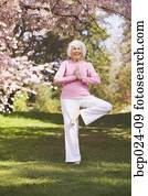 Older woman in a yoga position