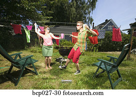 Couple dancing in backyard
