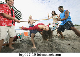 People at a beach party People at a beach party