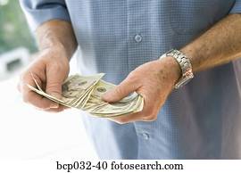 Man holding American currency