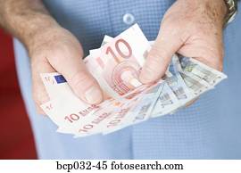 Man holding euro banknotes