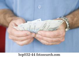 Man holding euro banknotes