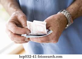 Man holding euro banknotes