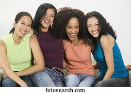 Group of young women looking at camera smiling