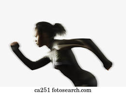 Side profile of a young woman running