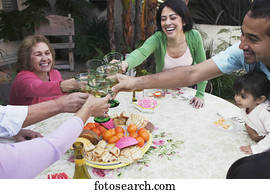Group of people toasting glasses of wine