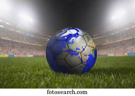 bola futebol, pintado, semelhante, um, globo, descansar, capim, em, grande, estádio