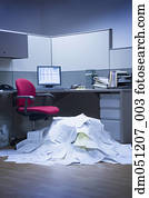 Mountain of paper in office space