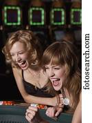 Women gambling at a casino