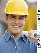 trabalhador manual, segurando, desenhos técnicos