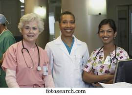African female doctor with female nurses, Bethesda, Maryland, United States