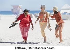 Group of middle-aged women at the beach, Miami, Florida, United States