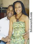 African American couple hugging