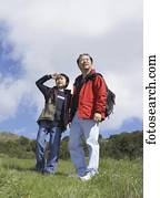 Asian father and son outdoors