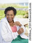 Senior woman laughing outdoors Senior woman laughing outdoors