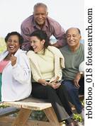 Two senior couples laughing outdoors Two senior couples laughing outdoors