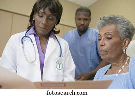 African female doctor with co-workers