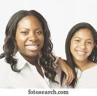 African mother and daughter smiling