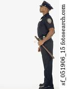 Studio shot of African male police officer