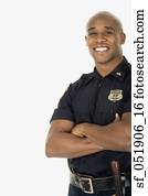 Studio shot of African male police officer smiling