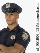 Studio shot of African male police officer