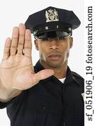 Studio shot of African male police officer