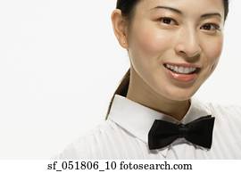 Studio shot of Asian woman smiling