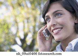 Hispanic businesswoman talking on cell phone